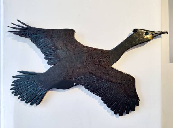 - a , wood Sculpture by John Comley, measuring 36 x 56 cm (H x W) £250